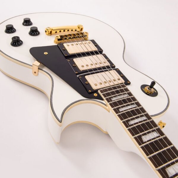Vintage V1003AW Reissued 3 Pickup Electric Guitar Arctic White - Angle