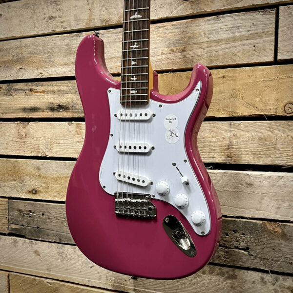 PRS SE John Mayer Silver Sky Rosewood Fingerboard – Dragon Fruit - Angle 2