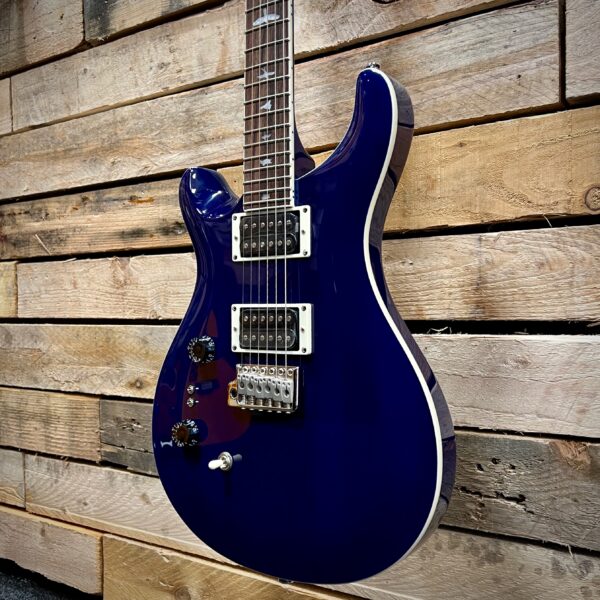 PRS SE Standard 24-08 Left Handed Electric Guitar - Translucent Blue - Angle 2